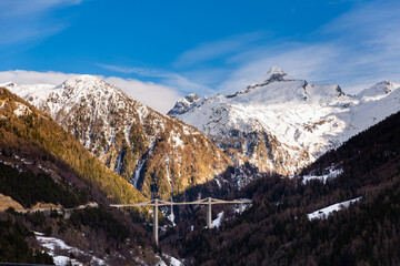View on Ganter bridge and snowy Alps mountains near Brig at Valais, Switzerland, in winter