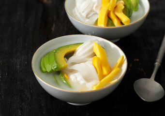 Es Teler, Traditional Indonesian Ice Dessert of Tropical Fruit Cocktail in Sweet Coconut Water and Condensed Milk
