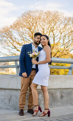 latin bride and groom newlyweds in front of the tree of life. vertical photo