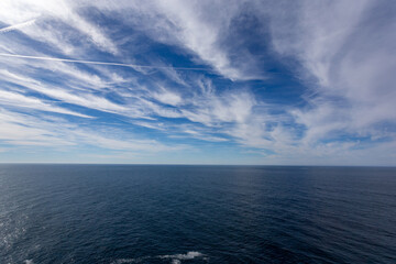 A view on the Pacific ocean seashore with blue sky