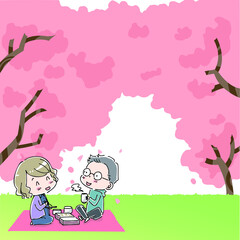 桜の木の下でお弁当を食べる男女