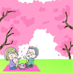 桜の木の下でお弁当を食べる家族