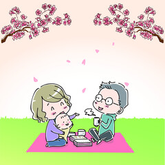 桜の花の下でピクニックシートを広げてお弁当を食べる家族