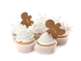 Tasty Christmas cupcakes with snowflakes and gingerbread men on white background