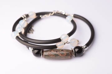 Women's bracelet with stones on white background