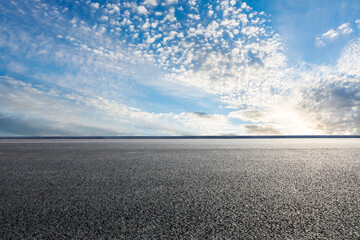 Empty asphalt road and beautiful sky clouds background