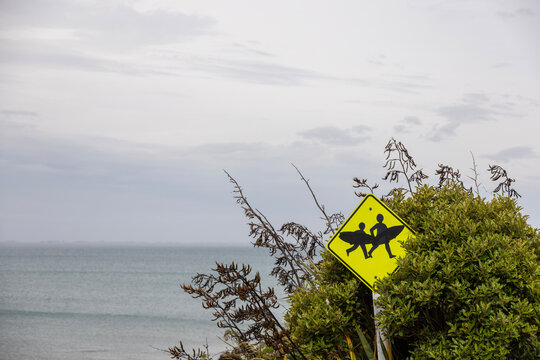 sign at the beach for surfers