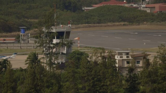 Tele photo scene of the air traffic control tower at koh samu airport- Koh Samui island in Thailand