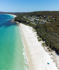 Aerial view of  the beautiful Chinamans (in distance) and Greenfield beach in NSW, Australia, a popular white sand swimming beach
