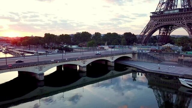 Aerial shot climbing and panning : Iena bridge, Eiffel tower, champ de Mars and Invalides