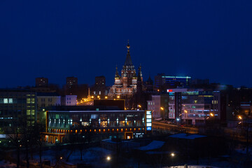 Night panorama of the city with illuminated buildings. Sights of Izhevsk.