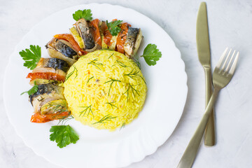 Baked mackerel with vegetables. Ready-made seafood dish.