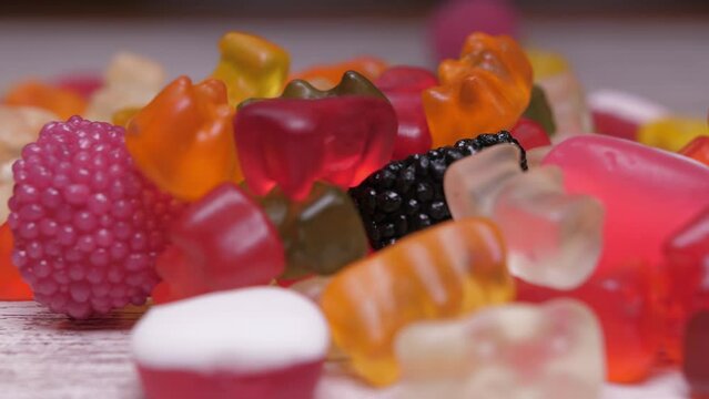 sweet colorful candy gummy falling slow motion 4k