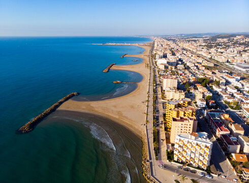 Aerial drone view of Playa de Cunit on sunny winter day, Tarragona, Spain