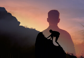 Man climbing up mountain working hard to reach the top. Never give up, and goal setting concept. 