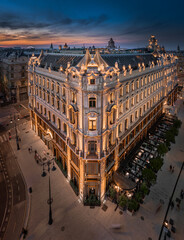 Budapest, Hungary - Aerial view of a renovated illuminated luxury collection hotel near Ferenciek...