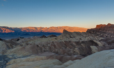 Fototapeta na wymiar Zabriski point is one of the most colourful spots in Death Valley national park, in particular during sunrise, as depicted in this image.