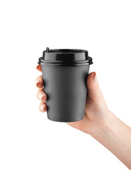 A paper cup of coffee in the hand isolated. Mock-up.