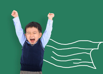  Happy asian kid against green blackboard with superhero and knowledge is power concept