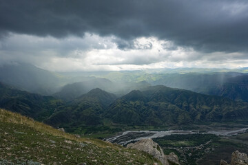 Fototapeta na wymiar Beautiful breathtaking view of the mountains during a thunderstorm in Dagestan, Caucasus Russia