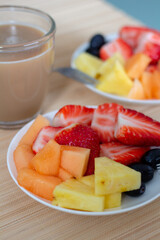 Colorful, ripe, delicious fruits on table and Coffee, breakfast, morning