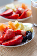 Colorful, ripe, delicious fruits on table and Coffee, breakfast, morning