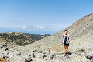 Hiker Woman in Rila Mountain with Stunning View. Musala Peak in Bulgaria in the Summer 