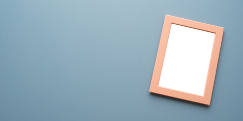 Empty pink wooden frame on grey background, copy space for mock up and template