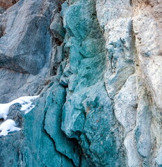 Rock with talcum powder close-up in winter