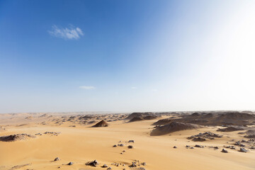 Fototapeta na wymiar Nature of the Black Desert with clear blue sky.