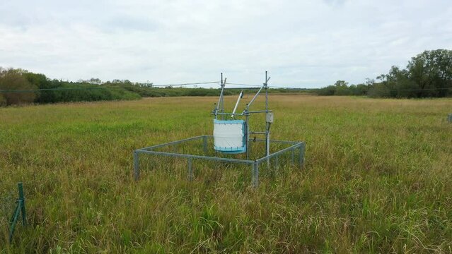 Station science research for studying wetlands meadows, drone aerial video shot ecosystem weather station swamp willows cycle carbon flux eddy covariance methane research physiological photosynthesis