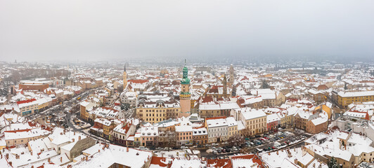Aerial panoramic view about Sopron city. Winter cityscape with snowy rooftops.