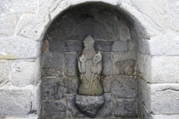 statue of a person in a cemetery