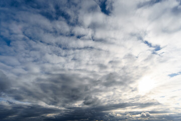 Naklejka na ściany i meble beautiful dark dramatic sky with stormy clouds before the rain or snow