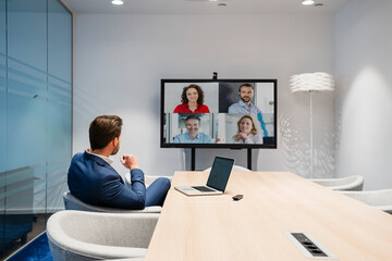 Businessman discussing in web conference at meeting room