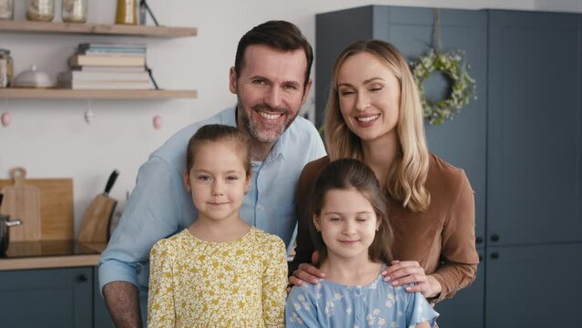 Portrait of caucasian family over easter dinner table. Shot with RED helium camera in 8K. 