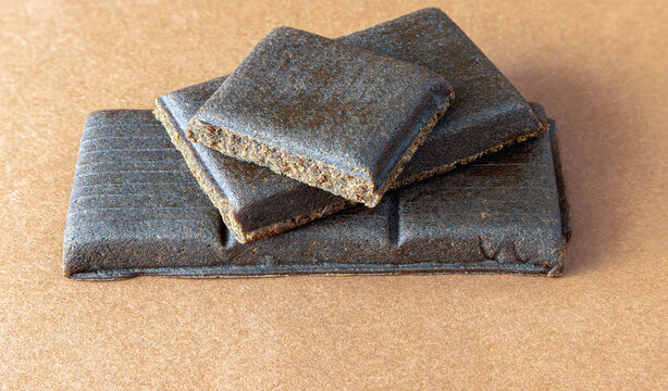 Sweet hematogen with iodine on a brown background