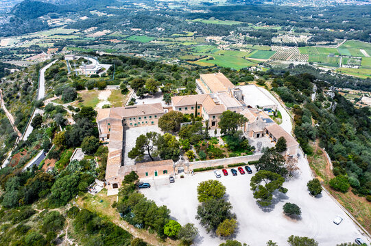 Spain, Mallorca, Helicopter view of Sanctuary of Cura situated on summit of Puig de Randa in summer