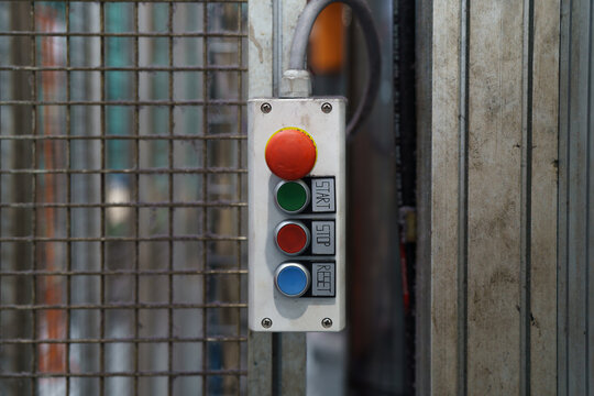 old, dirty industrial switching button control panel