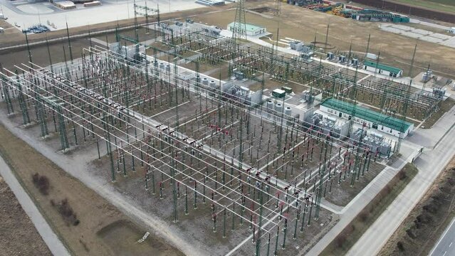 Arial footage of a high voltage power transformer station 