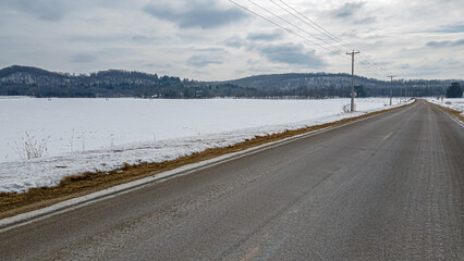 Rural roads next to winter hills