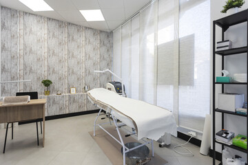Empty skin care treatment room at aesthetic clinic