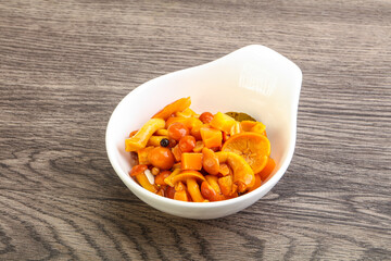 Marinated pickled honey mushrooms in the bowl