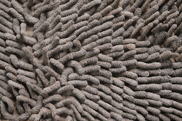 Gray foot mat worm doormat microfiber towel nano texture for background wallpaper graphic design.