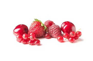 Different ripe tasty berries on white background such as strawberries, cherries, raspberries, blueberries, currants, blueberries.