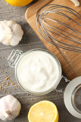 Concept of tasty food with garlic sauce, top view