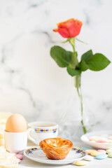 typical portuguese dessert pastel de nata and cup of coffee