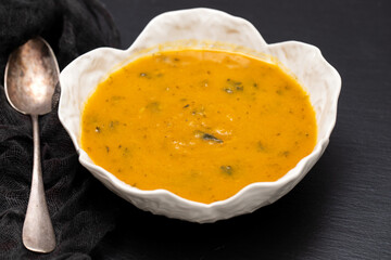 vegetable soup with spinach in beautiful bowl
