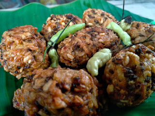 lento food from Indonesia. banana leaf background. close up shot outdoors.
