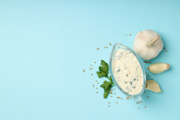 Concept of tasty food with garlic sauce, space for text